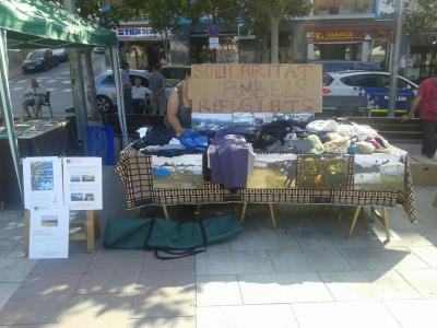 Parada solidària de la Plataforma pels Refugiats als encants dels aturats -Imatge 1-